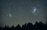 The Large Magellanic Cloud is visible in the Southern Hemisphere and is a satellite galaxy of the Milky Way. Image of The Large Magellanic Cloud is visible in the Southern Hemisphere and is a satellite galaxy of the Milky Way.