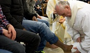 Francis washing the feet of Jesus in the poor Image of Francis washing the feet of Jesus in the poor