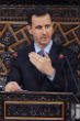 Assad figuratively slaps Obama, Obama wants more evidence of it. Image of Assad figuratively slaps Obama, Obama wants more evidence of it.