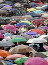 VATICAN CITY (Catholic Online) - With his characteristic affection for God's people, Pope Francis showed no concern for the rain as he moved through the crowd who gathered to hear his Wednesday talk. Image of VATICAN CITY (Catholic Online) - With his characteristic affection for God's people, Pope Francis showed no concern for the rain as he moved through the crowd who gathered to hear his Wednesday talk.