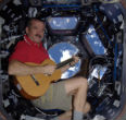 Chris Hadfield has a number of musical firsts in space. Image of Chris Hadfield has a number of musical firsts in space.