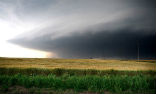 The El Reno Tornado was so massive that observers would have mistaken it for a low-hanging cloud base dipping below the horizon. Image of The El Reno Tornado was so massive that observers would have mistaken it for a low-hanging cloud base dipping below the horizon.
