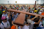 Faithful and enthusiastic, the world's youth are already crowding the Copacabana where Francis will say Mass. Image of Faithful and enthusiastic, the world's youth are already crowding the Copacabana where Francis will say Mass.