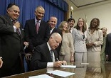Governor Jerry Brown signing California Assembly Bill 1266 into law. It mandates that restrooms in public schools, from kindergarten through the twelfth grade, no longer be limited to boys or girls, young men or young women. Image of Governor Jerry Brown signing California Assembly Bill 1266 into law. It mandates that restrooms in public schools, from kindergarten through the twelfth grade, no longer be limited to boys or girls, young men or young women.