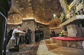 Pope prays at the tomb of the Little Poor Man, Francis of Assis Image of Pope prays at the tomb of the Little Poor Man, Francis of Assis