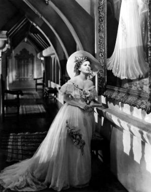 Joan Fontaine, reading the then-new best-seller 'Rebecca' she identified with the put-upon heroine struggling against a powerful - if dead rival. Joan Fontaine, reading the then-new best-seller 'Rebecca' she identified with the put-upon heroine struggling against a powerful - if dead rival.