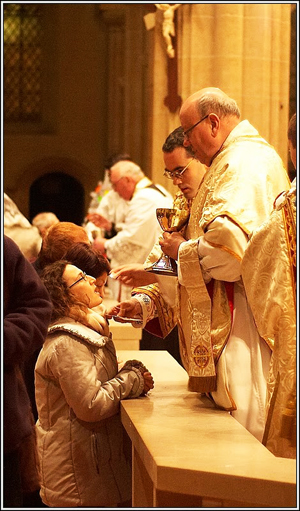 Receiving the Eucharist. Receiving the Eucharist.