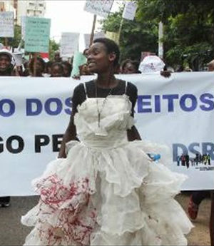 One young woman wore a blood-spattered wedding gown to lead a group of some 300 people in last week's march to protest near the parliament building, where some carried banners reading, 'Marry the rapist? No!' One young woman wore a blood-spattered wedding gown to lead a group of some 300 people in last week's march to protest near the parliament building, where some carried banners reading, 'Marry the rapist? No!'