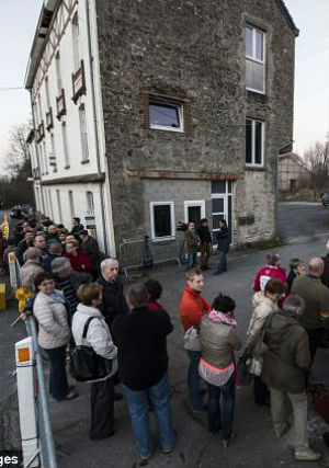 The town has since become a pilgrim destination in largely Catholic Belgium, although Catholic authorities from the Banneux sanctuary are expressing caution about the 'glowing' Virgin. The town has since become a pilgrim destination in largely Catholic Belgium, although Catholic authorities from the Banneux sanctuary are expressing caution about the 'glowing' Virgin.