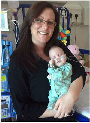 Little Amelia does have attendant health problems: She was born with her liver and bowel on the outside of her body, alongside respiratory problems -- but her health is improving every day. Little Amelia does have attendant health problems: She was born with her liver and bowel on the outside of her body, alongside respiratory problems -- but her health is improving every day.