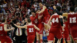 Wisconsin upset the first seeded team, University of Arizona, to place in the Image of Wisconsin upset the first seeded team, University of Arizona, to place in the