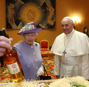 Pointing to the floor, Queen Elizabeth added that she also brought 'two extra bits which would not fit in the basket,' and which consisted of a bottle of whiskey and apple cider. Pointing to the floor, Queen Elizabeth added that she also brought 'two extra bits which would not fit in the basket,' and which consisted of a bottle of whiskey and apple cider.