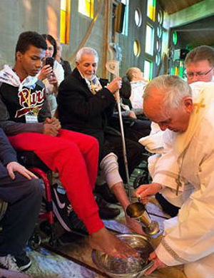 This year, Francis arrived at a center for the disabled and elderly in Rome. Francis kneeled down, washed, dried and kissed the feet of a dozen people, some in wheelchairs, other with grossly swollen and disfigured feet. This year, Francis arrived at a center for the disabled and elderly in Rome. Francis kneeled down, washed, dried and kissed the feet of a dozen people, some in wheelchairs, other with grossly swollen and disfigured feet.