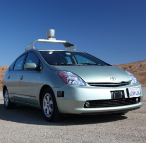 The vehicle lacks a certain aerodynamic design. It's described as 'a golf cart wearing a silly hat.' Intended to be disarming, the car is designed to encourage acceptance of self-driving technology. The vehicle lacks a certain aerodynamic design. It's described as 'a golf cart wearing a silly hat.' Intended to be disarming, the car is designed to encourage acceptance of self-driving technology.