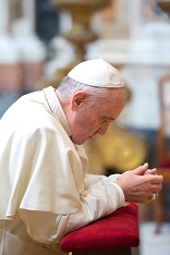 Pope Francis praying. The path to peace passes through prayer - because peace requires Gods assistance. Image of Pope Francis praying. The path to peace passes through prayer - because peace requires Gods assistance.