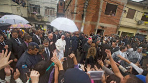 Pope Francis visits a slum during his visit to Brazil. Pope Francis visits a slum during his visit to Brazil.