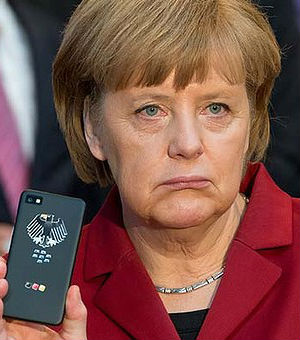 Merkel's critics in her native land have accused her of mismanaging the fallout from the scandal. Merkel's critics in her native land have accused her of mismanaging the fallout from the scandal.