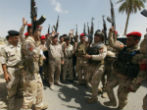 A group of Iraqi security forces celebrate in Baghdad. Image of A group of Iraqi security forces celebrate in Baghdad.