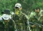 Members of Colombia's Marxist rebel organization the Revolutionary Armed Forces of Colombia, which have utilized the drug trade to fund their five-decade-long war against the Colombian government. Image of Members of Colombia's Marxist rebel organization the Revolutionary Armed Forces of Colombia, which have utilized the drug trade to fund their five-decade-long war against the Colombian government.