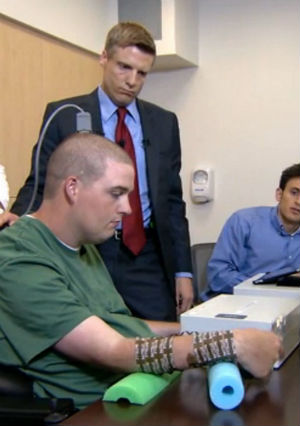 Ian Burkhart's initial attempt at using his thoughts to move his hand exceeded all his doctors' expectations. Doctors had originally thought he would be able to move one finger. Burkhart was able to curl his seemingly dead hand into a fist, then open it out flat and pick up a spoon. Ian Burkhart's initial attempt at using his thoughts to move his hand exceeded all his doctors' expectations. Doctors had originally thought he would be able to move one finger. Burkhart was able to curl his seemingly dead hand into a fist, then open it out flat and pick up a spoon.