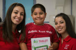 Lucia and Michelle, Catholic Team Global ambassadors, delivered the first batch of new XO tablets to Our Lady of Gaudalupe parish elementary school in Bakersfield, California. Image of Lucia and Michelle, Catholic Team Global ambassadors, delivered the first batch of new XO tablets to Our Lady of Gaudalupe parish elementary school in Bakersfield, California.