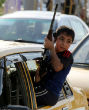 An Iraqi child who has joined the volunteer Shiite militias which are springing up to battle the Sunni Muslim group ISIS. Image of An Iraqi child who has joined the volunteer Shiite militias which are springing up to battle the Sunni Muslim group ISIS.