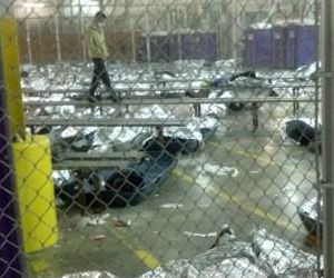 Members of the media were denied access to the facility, but officials who went inside said conditions were improving from early photos shared online showing children covered with aluminum-foil blankets. Members of the media were denied access to the facility, but officials who went inside said conditions were improving from early photos shared online showing children covered with aluminum-foil blankets.