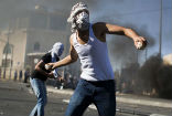 Parts of East Jerusalem have erupted in violence after the abduction and death of a teenage Palestinian. Image of Parts of East Jerusalem have erupted in violence after the abduction and death of a teenage Palestinian.