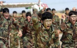 Kurdish fighters have engaged militants belonging to the new Islamic State after watching the fighting for nearly four months. Image of Kurdish fighters have engaged militants belonging to the new Islamic State after watching the fighting for nearly four months.