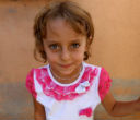 A child of the Yazidi minority group, noted for blonde hair, blue eyes and a fairer complexion. Image of A child of the Yazidi minority group, noted for blonde hair, blue eyes and a fairer complexion.