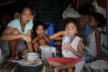 More than 1/3 of all Filipinos live below the poverty line. Image of More than 1/3 of all Filipinos live below the poverty line.