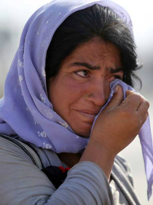 yazidi woman middle iraqi islam village east catholic far eyes camp her villagers massacre militants convert refuse who kills refused