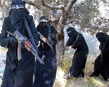 Some reports indicate that ISIS now has roving patrols in the city of Raqqa, including women draped in head to floor burqas, who are ordered to ensure strict compliance with their version of Islamic Dress codes. Image of Some reports indicate that ISIS now has roving patrols in the city of Raqqa, including women draped in head to floor burqas, who are ordered to ensure strict compliance with their version of Islamic Dress codes.