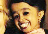 At two feet, half-an-inch tall, Jyoti Amge of India is the world's smallest woman. Image of At two feet, half-an-inch tall, Jyoti Amge of India is the world's smallest woman.