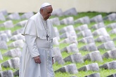 Pope Francis walks inside the Austro-Hungarian cemetery at Fogliano in Redipuglia September 13, 2014. REUTERS/Stefano Rellandini Image of Pope Francis walks inside the Austro-Hungarian cemetery at Fogliano in Redipuglia September 13, 2014. REUTERS/Stefano Rellandini
