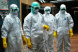 Red Cross workers in Guinea in protective gear. Currently, Guinea, Sierra Leone and Liberia are the worst nations worst hit by the West African Ebola outbreak. Image of Red Cross workers in Guinea in protective gear. Currently, Guinea, Sierra Leone and Liberia are the worst nations worst hit by the West African Ebola outbreak.