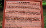 A history of Nalanda University set in a plaque. Image of A history of Nalanda University set in a plaque.