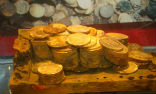 Gold coins recovered from the SS Central America. Image of Gold coins recovered from the SS Central America.