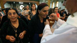 Iraqi Christians receive communion in the Kurdish city of Arbil. Sunday was the first time in 2,000 years no communion was offered in Nineveh, because no Christians remain. Image of Iraqi Christians receive communion in the Kurdish city of Arbil. Sunday was the first time in 2,000 years no communion was offered in Nineveh, because no Christians remain.