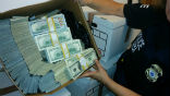 Federal officers seized $100 million from downtown Los Angeles businesses as part of an anti-cartel bust. Image of Federal officers seized $100 million from downtown Los Angeles businesses as part of an anti-cartel bust.