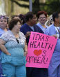 Supporters of Nina Pham, the nurse who was infected with Ebola at Texas Health Presbyterian hospital. Image of Supporters of Nina Pham, the nurse who was infected with Ebola at Texas Health Presbyterian hospital.