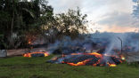 Lava from the Kilauea volcano on the island of Hawaii threatens to destroy the village of Pahoa and now it sits within 100 yards of the first house. Image of Lava from the Kilauea volcano on the island of Hawaii threatens to destroy the village of Pahoa and now it sits within 100 yards of the first house.