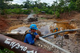 Oil drilling in the Amazon rainforest has caused great destruction of the once fertile and incredibly diverse ecosystem there. Image of Oil drilling in the Amazon rainforest has caused great destruction of the once fertile and incredibly diverse ecosystem there.