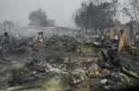 The rubble of a building demolished during an attack by the Islamist group Boko Haram, which has waged a five year insurgency against the Nigerian government. Image of The rubble of a building demolished during an attack by the Islamist group Boko Haram, which has waged a five year insurgency against the Nigerian government.