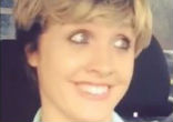 With a short brown wig, Lauren O'Brien does a perpetually perky Ellen DeGeneres who lets the world know that a traffic jam is not going to get her down! Image of With a short brown wig, Lauren O'Brien does a perpetually perky Ellen DeGeneres who lets the world know that a traffic jam is not going to get her down!