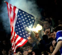 Protesters burn an American flag. The nation has many enemies, both within and without. Image of Protesters burn an American flag. The nation has many enemies, both within and without.