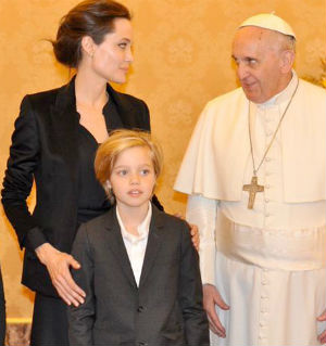 Glamour icon and director Angelina Jolie met with Pope Francis at the Vatican after a screening of her film 'Unbroken,' about Olympic track star and prisoner-of-war Louis Zamperini. Glamour icon and director Angelina Jolie met with Pope Francis at the Vatican after a screening of her film 'Unbroken,' about Olympic track star and prisoner-of-war Louis Zamperini.