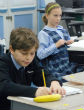 Fourth-grade students work on personalized language arts activities at St. Thomas More Cathedral School in Arlington. (Christine Stoddard, The Arlington Catholic Herald) Image of Fourth-grade students work on personalized language arts activities at St. Thomas More Cathedral School in Arlington. (Christine Stoddard, The Arlington Catholic Herald)