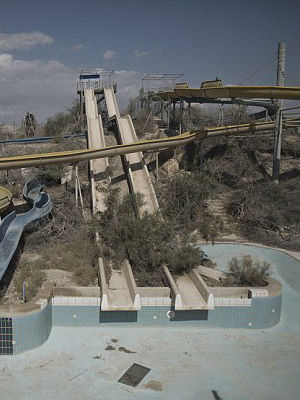 Evidence of the water scarcity manifests itself as exposed sinkholes, cracked mud flats, damaged plants and even a derelict water park. Evidence of the water scarcity manifests itself as exposed sinkholes, cracked mud flats, damaged plants and even a derelict water park.