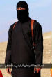 A man dressed in all black, with British accent, threatens the lives of two Japanese men in newest ISIS video. Image of A man dressed in all black, with British accent, threatens the lives of two Japanese men in newest ISIS video.